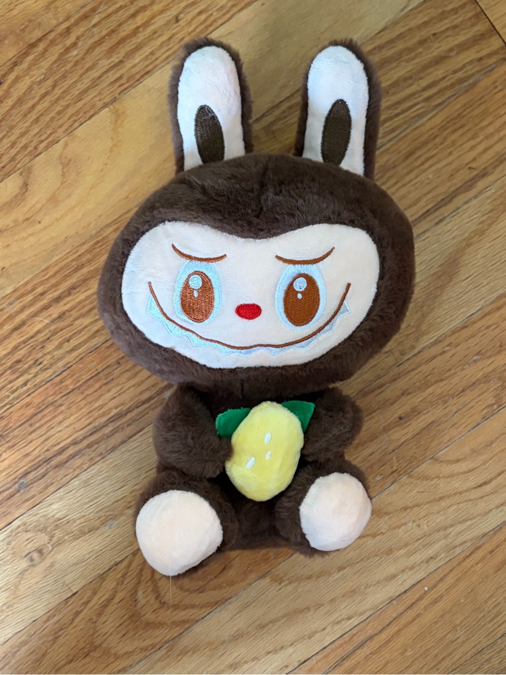 Plush Bunny Character Toy in Brown with Yellow Lemon